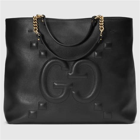 real leather gucci tote|Gucci embossed leather tote bag.